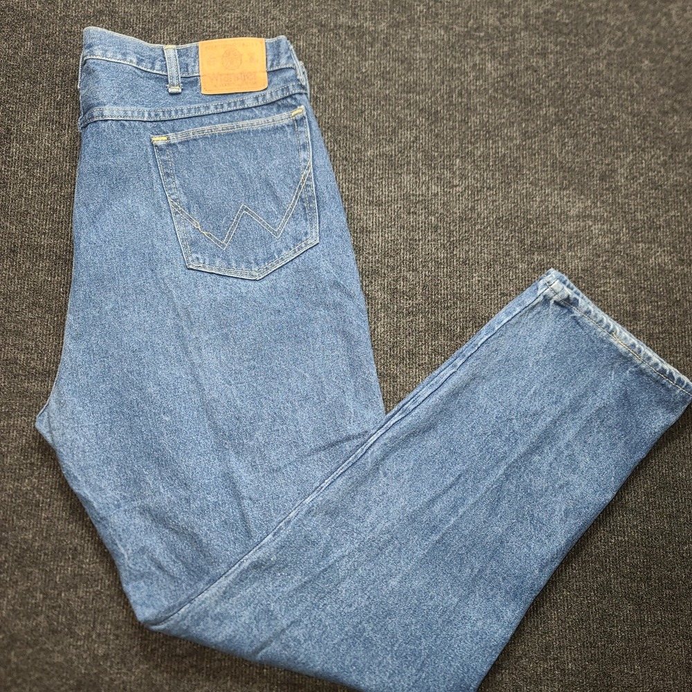 Wrangler Men's Straight Jeans in Medium Blue Denim with Leather Patch